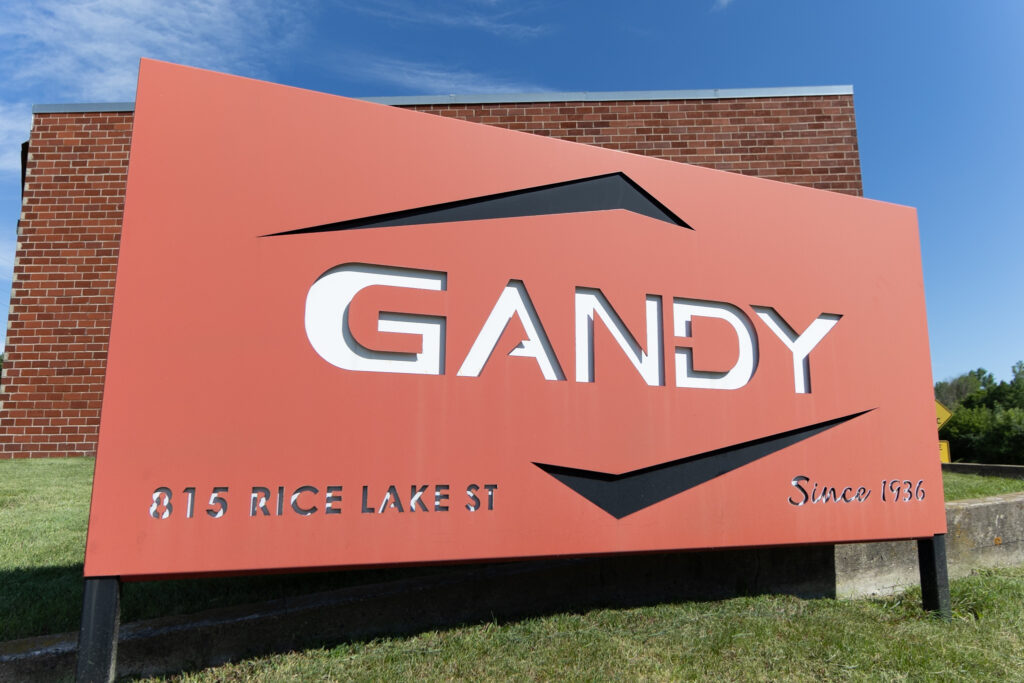 Gandy red sign in front of building 